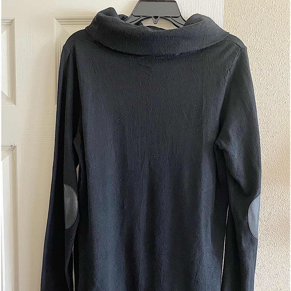 Black turtleneck tunic sweater w/faux leather patches on elbows.